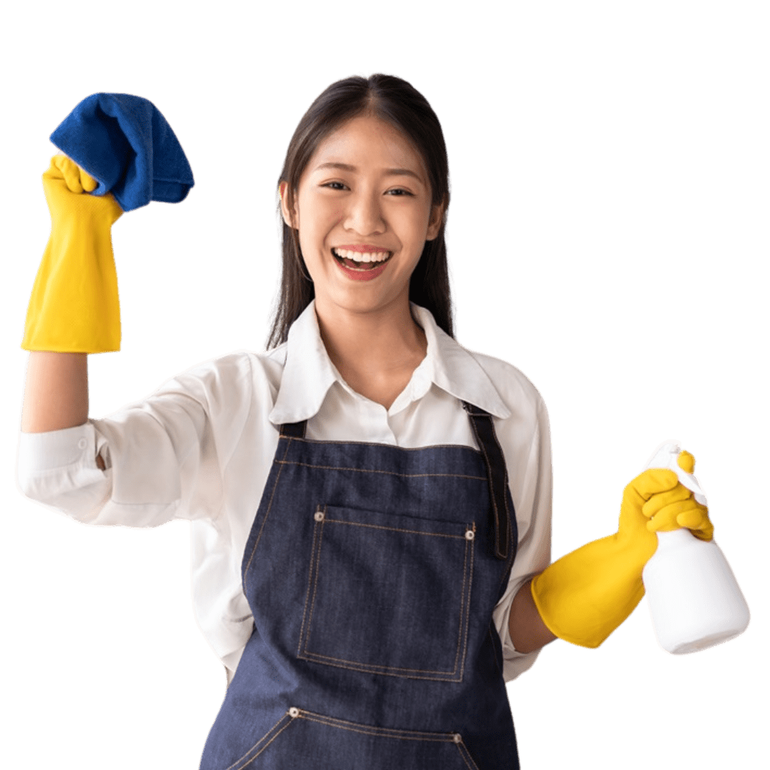 A cheerful person, representing Cleaning Services in Kansas City, dons an apron and yellow gloves, holding a blue cloth in one hand and a spray bottle in the other, smiling brightly.